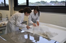MPhil Textile Conservation students doing practical work in November 2010